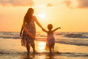 mom and daughter in the sunlight in florida