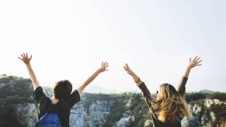 young women over looking a canyon