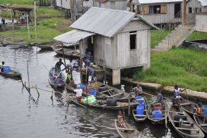 african village river with boats