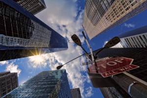 city scape with stop sign