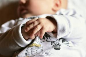 young infant happy and healthy