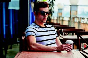 young man drinking coffee