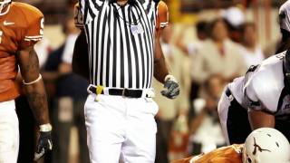 referee signaling touchdown