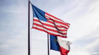 american and texas flags