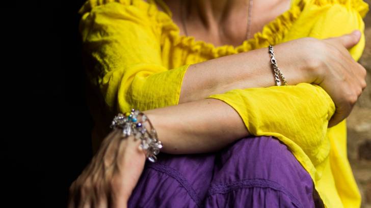 woman in yellow shirt
