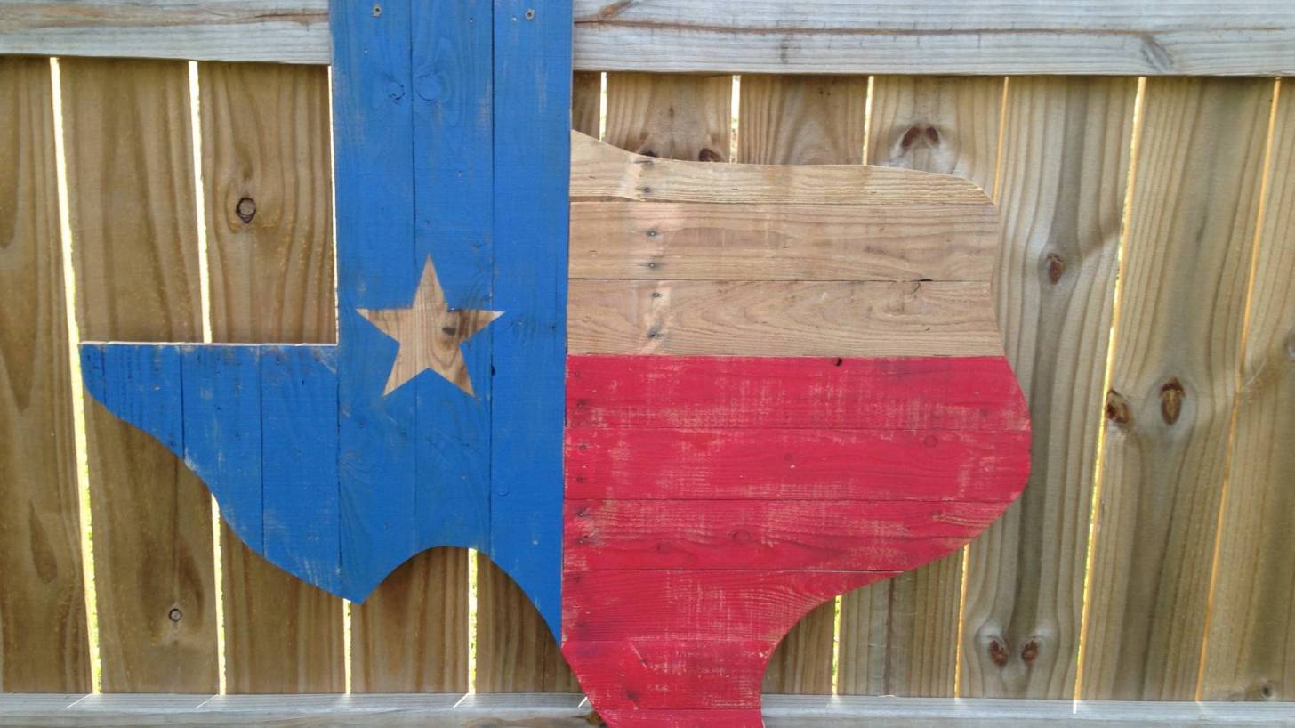 texas state carved out in a block of wood